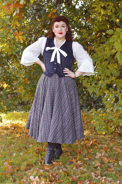 Plus size pinup Miss Amy May models the Annie corduroy waistcoat by Joanie Clothing for a fit and size review