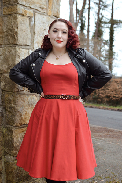 Plus size pinup Miss Amy May models the red Nancy dress by Hell Bunny for a fit and size review