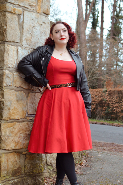 Plus size pinup Miss Amy May models the red Nancy dress by Hell Bunny for a fit and size review