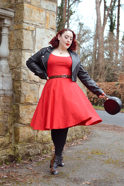 Plus size pinup Miss Amy May models the red Nancy dress by Hell Bunny for a fit and size review