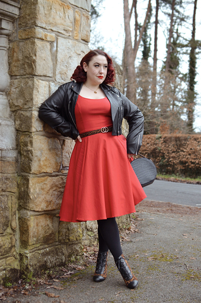 Plus size pinup Miss Amy May models the red Nancy dress by Hell Bunny for a fit and size review