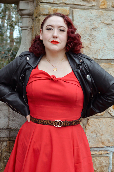 Plus size pinup Miss Amy May models the red Nancy dress by Hell Bunny for a fit and size review