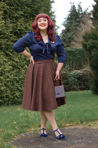Plus size pinup Miss Amy May models the Sophie woollen skirt by Timeless London for a fit and size review
