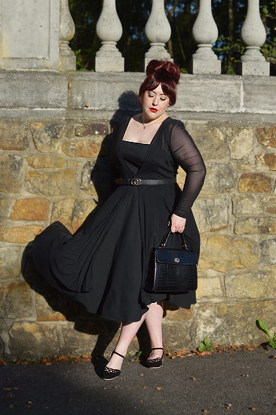 Miss Amy May models the black Serpente flats by Charlie Stone Shoes from the Dark Academia collection