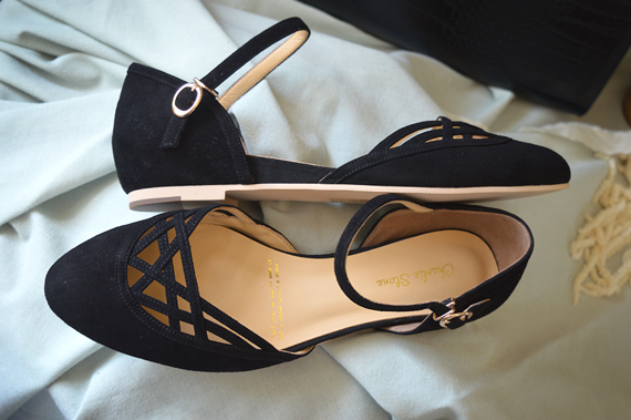 Miss Amy May models the black Serpente flats by Charlie Stone Shoes from the Dark Academia collection