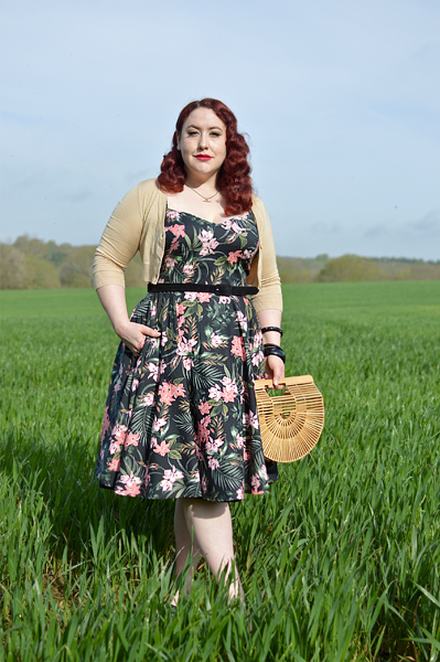 Plus size pinup Miss Amy May models the Calypso dress by Hell Bunny for a fit and sizing review
