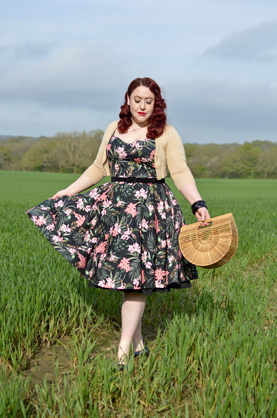 Plus size pinup Miss Amy May models the Calypso dress by Hell Bunny for a fit and sizing review