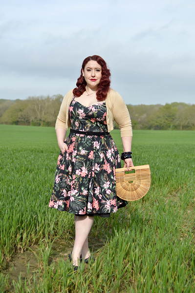 Plus size pinup Miss Amy May models the Calypso dress by Hell Bunny for a fit and sizing review