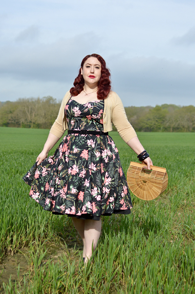 Plus size pinup Miss Amy May models the Calypso dress by Hell Bunny for a fit and sizing review