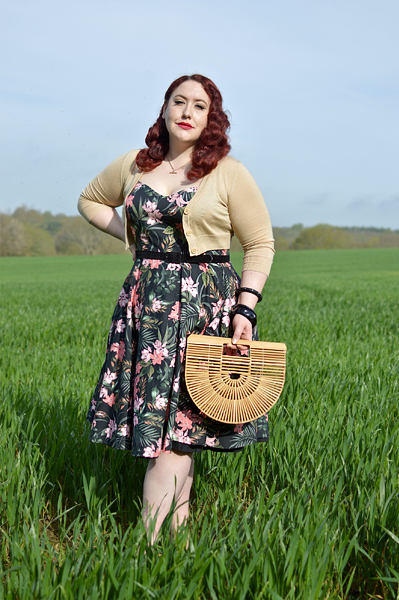 Plus size pinup Miss Amy May models the Calypso dress by Hell Bunny for a fit and sizing review