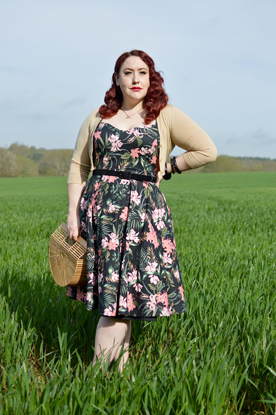 Plus size pinup Miss Amy May models the Calypso dress by Hell Bunny for a fit and sizing review