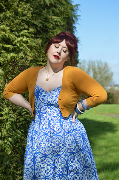 Plus size pinup Miss Amy May models the Sicily dress by Hell Bunny for a fit and size review